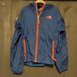 The North Face Blue Jacket with Bright Orange Details